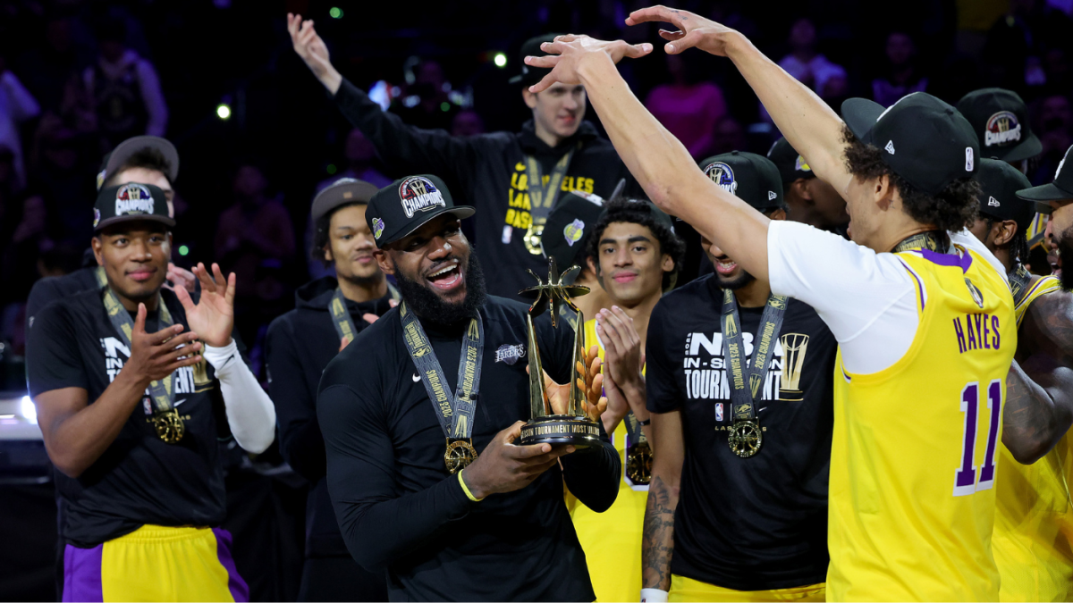 lebron holds ist mvp trophy